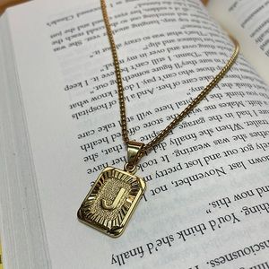 Initial letter pendant necklace “J”